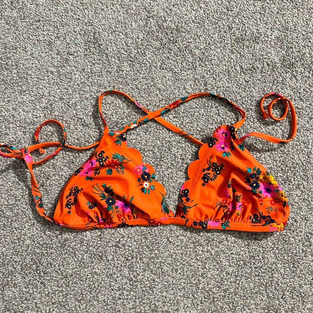 Orange bikini with pink flower design